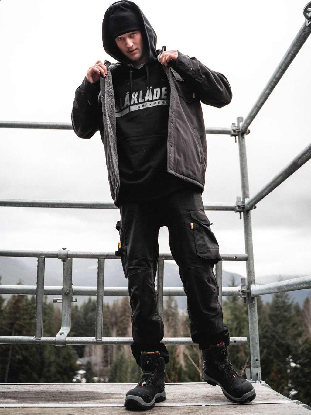 Tradesman wearing Blaklader Workwear on a construction site