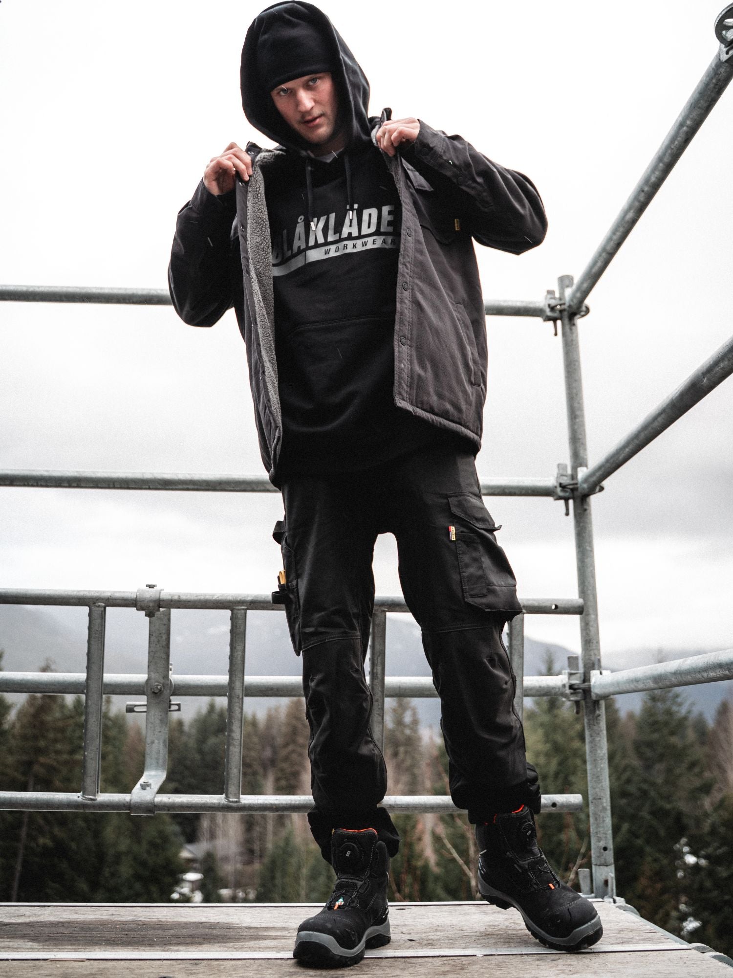 Tradesman wearing Blaklader Workwear on a construction site