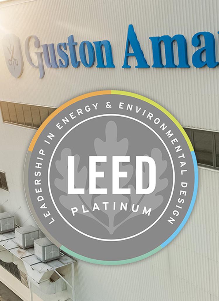 Guston Aman building with LEED Platinum certification logo