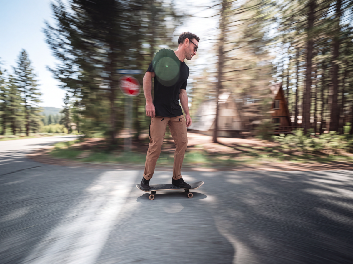 Translation missing: en.Tradesman wearing solano ventilated lite pants in color Nougat while riding a skateboard